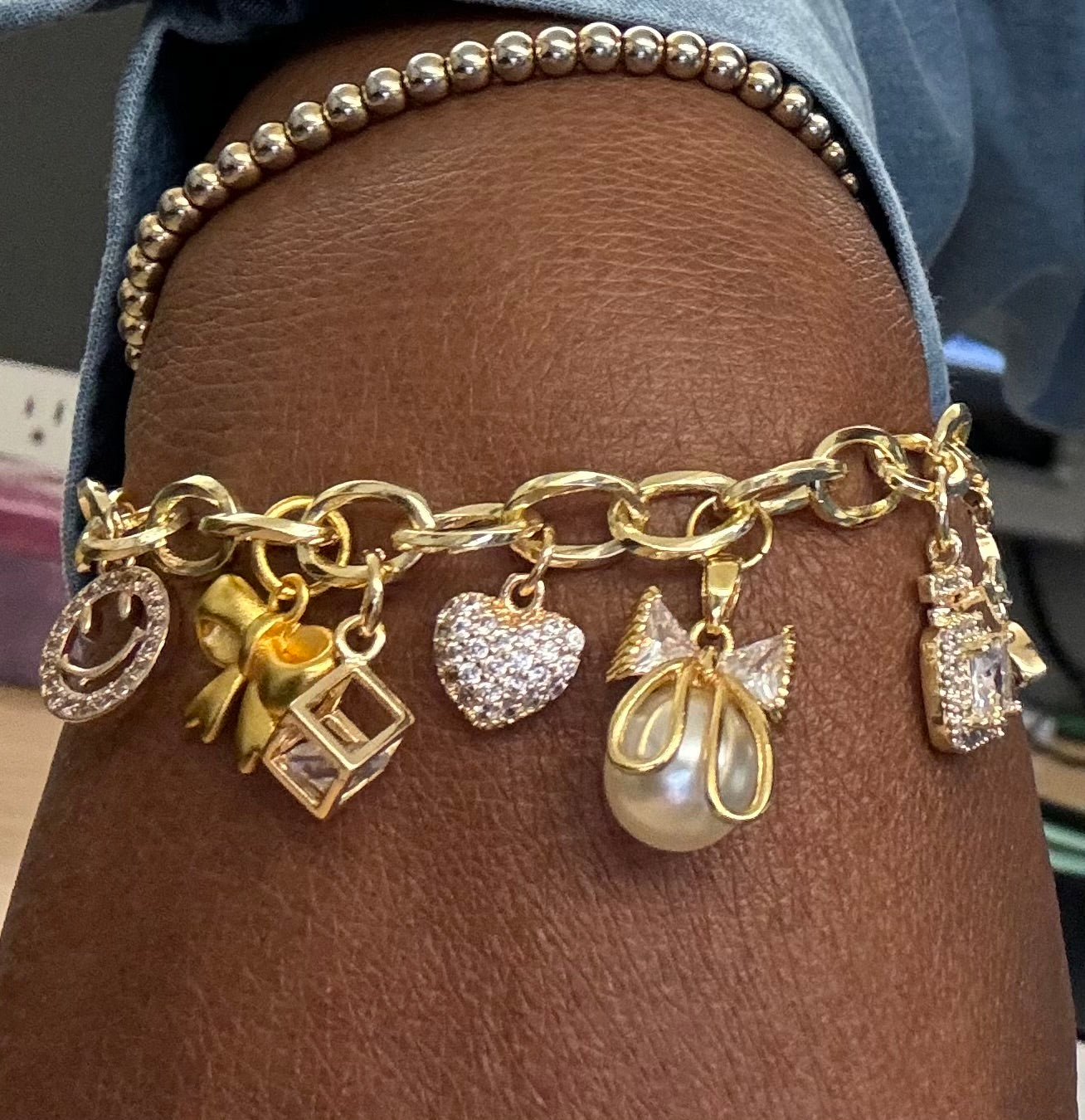 Make purchase and return to LIVE to choose bracelet and charms!